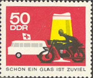 Motor cyclist and glass of beer